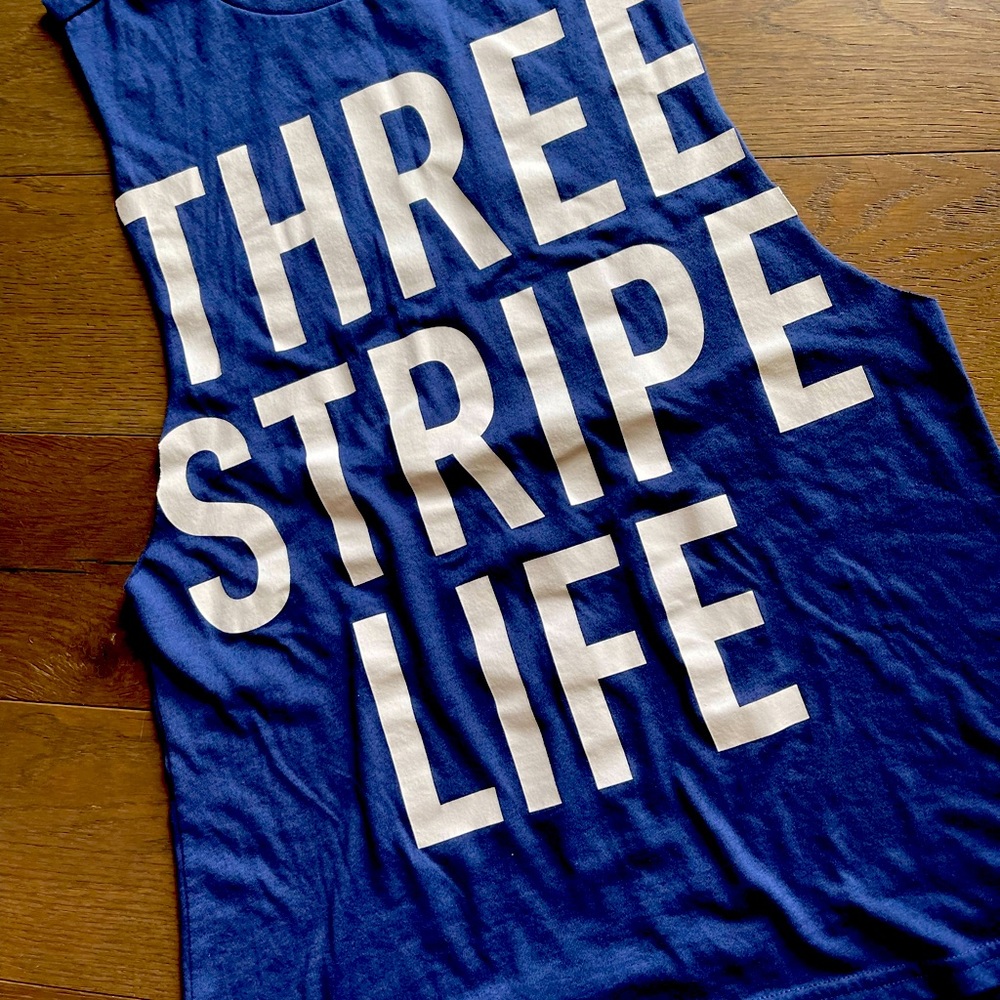 Adidas cut off shirt. Womens med. Blue